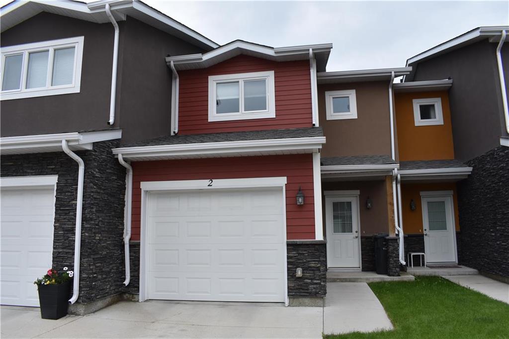 FEATURED LISTING: 2 - 908 Headmaster Row Winnipeg