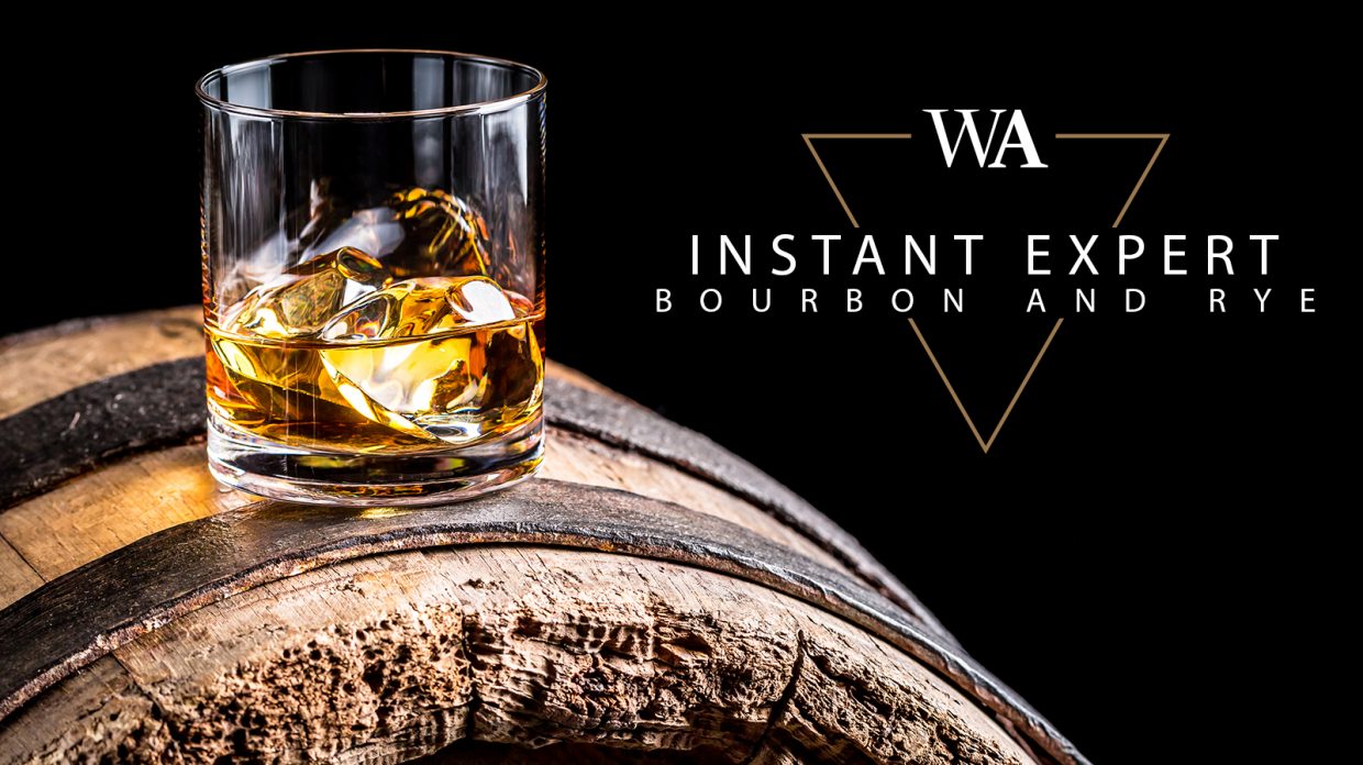 Rocks glass of bourbon whiskey on top of a barrel with the words "Instant Expert Bourbon and Rye" and Whisky Advocate logo.