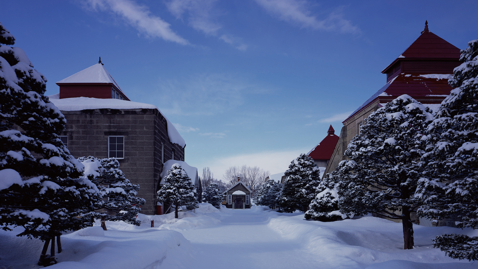 yoichi distillery in japan, covered in snow