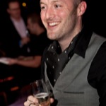 Man_in_waistcoat_with_champagne_thumb