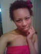 a wash n go decorated with a floral headband - Curly kinky hair