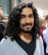 curly man at isse - 3a