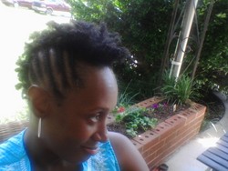 Side view of two-strand twist frohawk - Short hair styles, Readers, Female, Curly hair, Black hair, Adult hair, Natural Hair Celebration hairstyle picture
