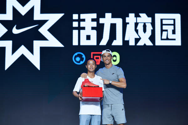 Cristiano Ronaldo Surprises Award Recipients in Beijing