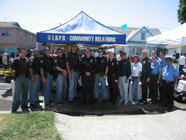group_shot_in_front_of_comm_relations_tent_cops__1_.JPG