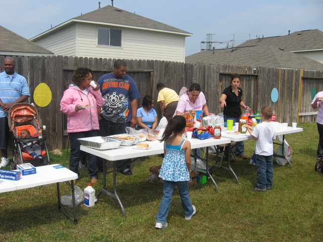 Volunteers_serving__Hot_Dogs.JPG