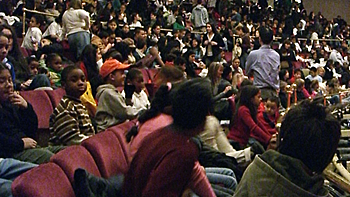 Students take their seats for The Mikado 2007.