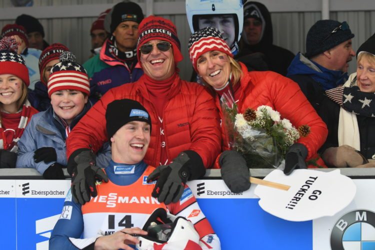 United States luge athlete Tucker West shares smiles with his mother Pam and father Brett after the 22-year-old captured the bronze medal Friday in men’s singles on the first day of World Cup racing at Mount Van Hoevenberg. The World Cup action wraps up in Lake Placid today with women’s singles and the sprint competitions. It was announced Friday that West will join the men’s team headed to Pyeongchang for the Olympics.
(Enterprise photo — Lou Reuter)