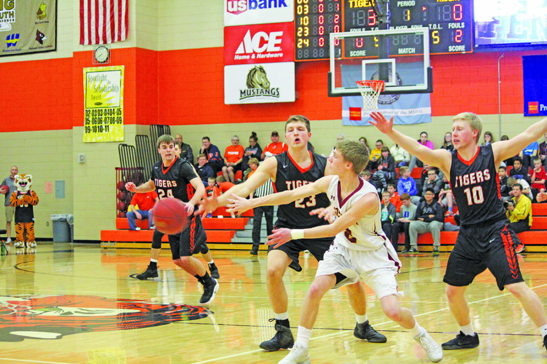 PREP BOYS BASKETBALL Tigers roll past Sioux falls Roosevelt News