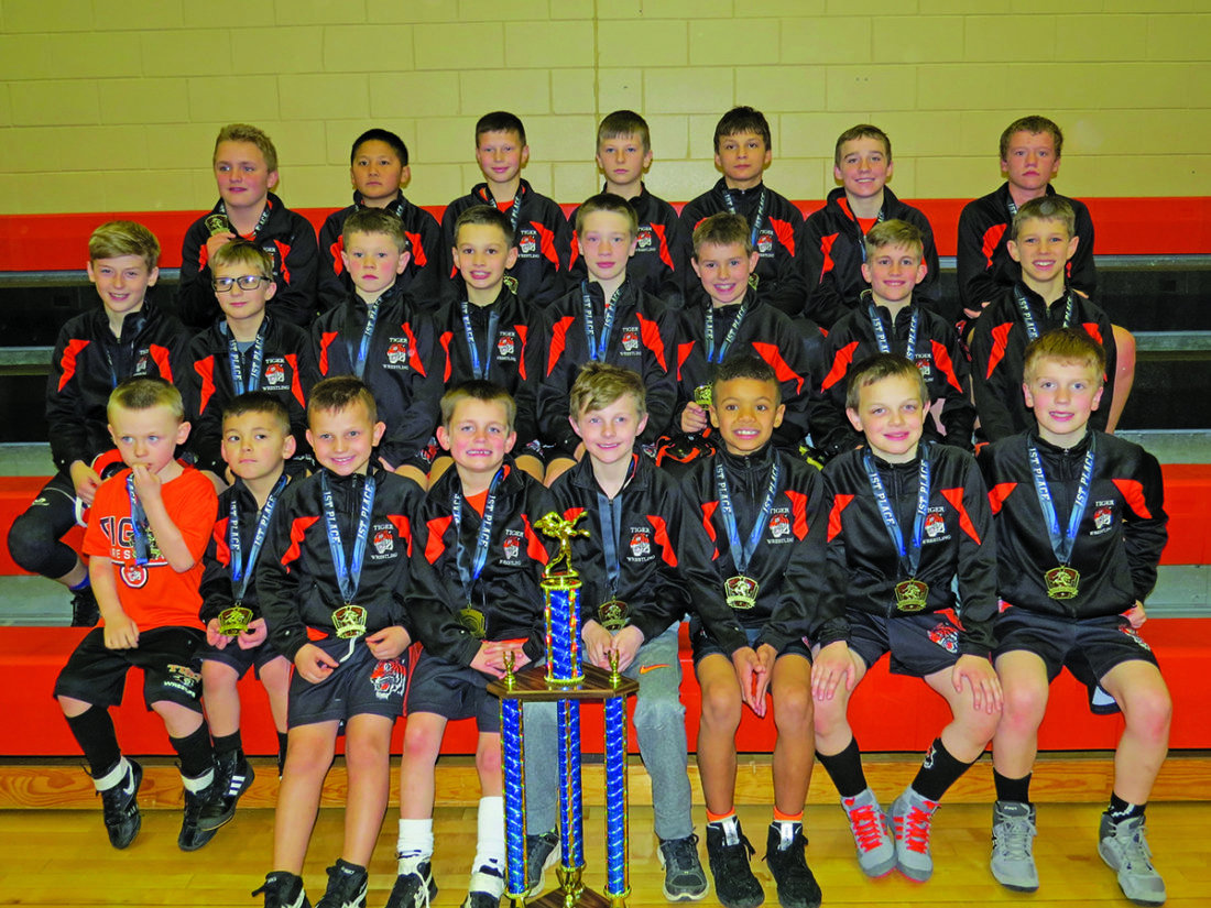 YOUTH WRESTLING Tiger youth wrestlers take first at home tournament