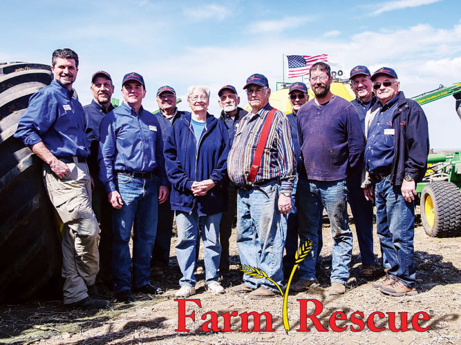 Submitted Photo
Shaun Sipma, left, and other volunteers with Farm Rescue gather at a event. Sipma is a member of the Farm Rescue board.