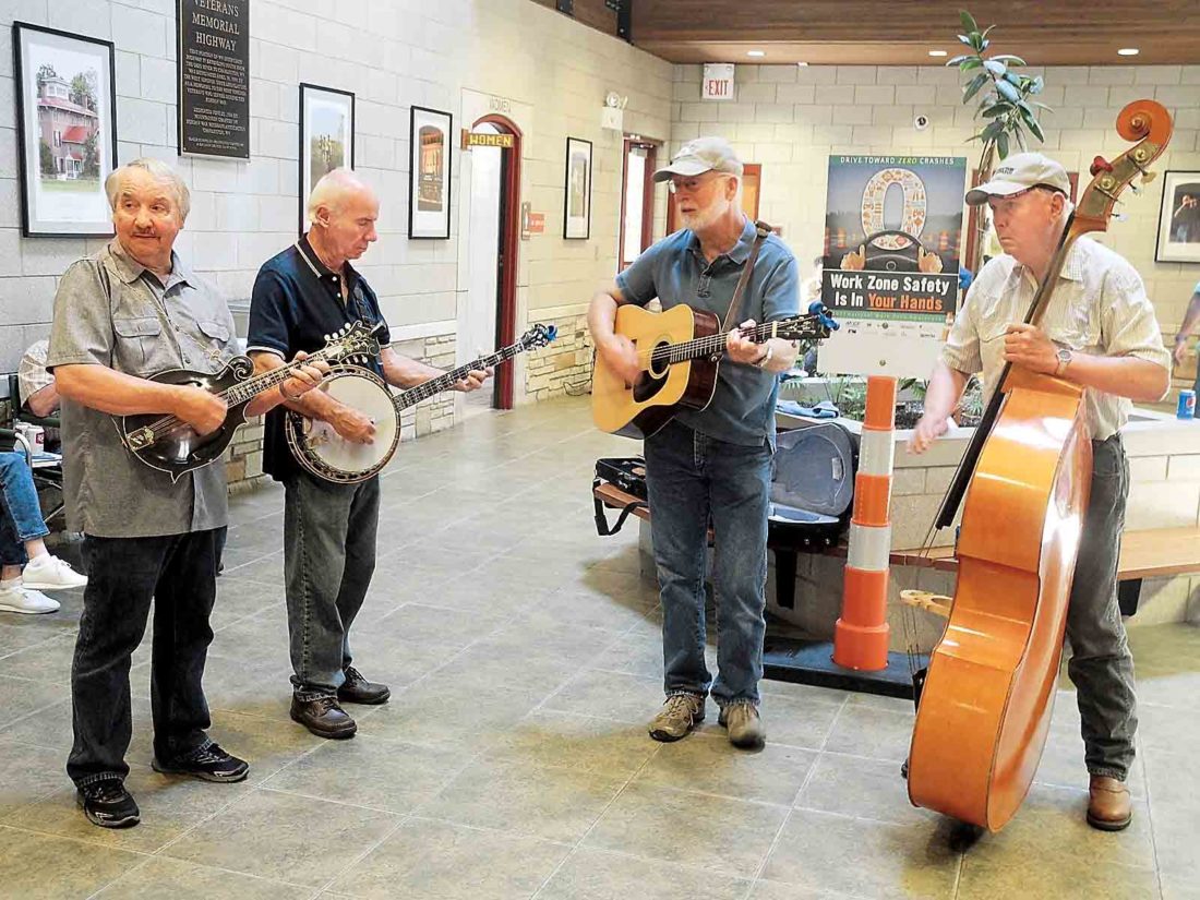Members of Buck and Company perform at the Williamstown Visitors Center during a West Virginia Day celebration Tuesday. (Photo by Jeffrey Saulton)