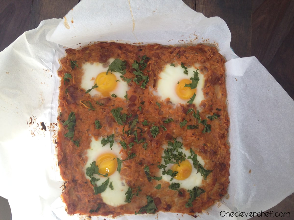 Sweet Potato And Caramelized Onion Hash With Baked Eggs On Top One