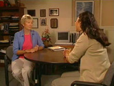 mom at table with teacher