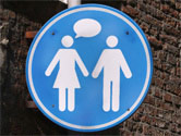 sign with people talking
