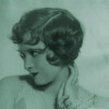 Blue-tinted vintage 20s photo of singer Helen Kane