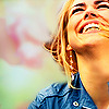 Closeup of Rose Tyler from Doctor Who, grinning.