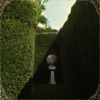 eye-level view of walking through a hedge maze