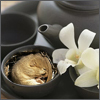 a black tea service, a dormouse asleep in the cup