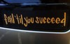 Bumper sticker that reads "Fail 'til you succeed."