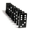 Row of dominoes standing on end