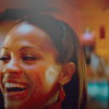 Nyota Uhura laughs delightedly.