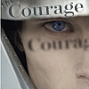 Close up of Arthur (Merlin TV show) in helmet with word "Courage" on rim of helmet.