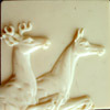 Ivory colored stag and doe relief