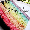 A cake in rainbow colours. Taste the rainbow!