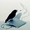 a raven with a laptop and a microphone