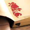 a textured flower imprint on a book
