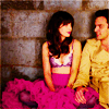 New Girl: the game is True American but with a sexy new twist (Nick & Jess; behind the iron curtain; hand on her knee, eyes on her face)