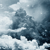 Thuck plumes of white clouds tinted blue