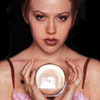 majandra delfino holding a crystal ball.