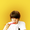 Korean person eating with red chopsticks