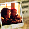 Frank and Gerard's faces framed in a Polaroid