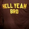 The back of a jacket, reading "Hell yeah bro"