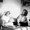 Frank O'Hara & Grace Hartigan sitting on a couch