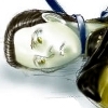 Data lying down, sad eyes, ribbon around neck