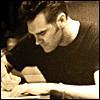 morrissey writing at a desk