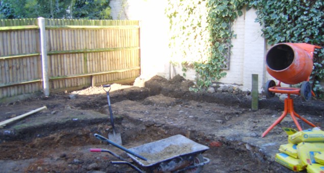 There was no practical area to sit and a lawn which often became waterlogged. Planting to either side was out of scale to the small plot and only served to exacerbate the shade problem. 