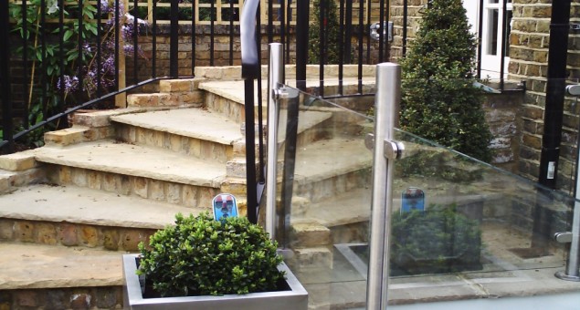 The lower set of steps was made safe with balustrades. The flight leading up to the study was also improved, by introducing a curve to allow for more, and shallower steps with a traditionally styled metal handrail.