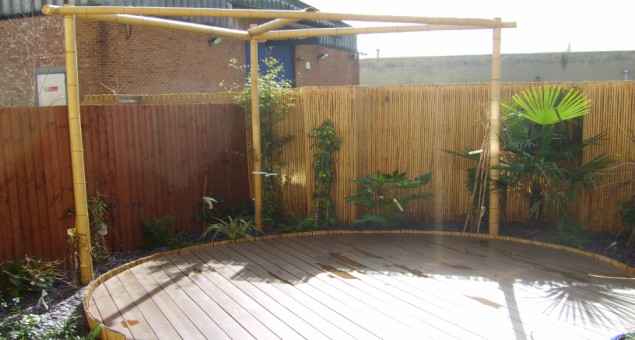 The bamboo screening also had the effect of screening the commercial buildings to the rear from view. 