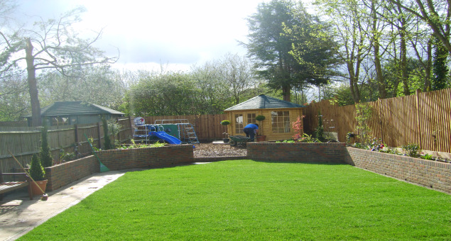 A large area has been set aside for the children at the rear, housing their climbing frame and mulched with a thick layer of play-bark.