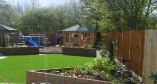 Colourful planting and an attractive new summerhouse complete the scene.