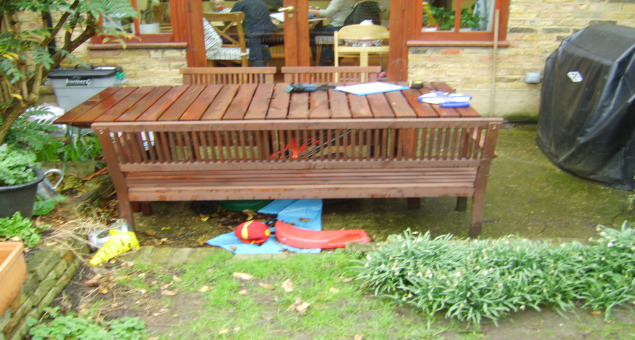 The house had been extended to provide a large kitchen/family dining room with doors to the garden. An attempt had been made at decking outside these doors, but it was not a sensible size for dining.