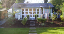image of a family garden with a pavilion style shed