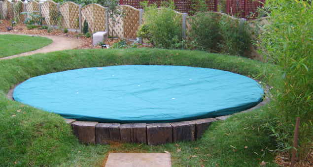 Whilst fun, large trampolines can be a bit of an eyesore, so we decided to sink it down into the ground and also to terraform the earth into a mound all around it. This not only helped to conceal it, but also made it safer to use and provided a place for the children to sit whilst watching others doing the bouncing.