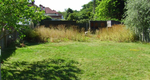 The family wanted a practical, but attractive garden for play and for entertaining unlike the original garden!