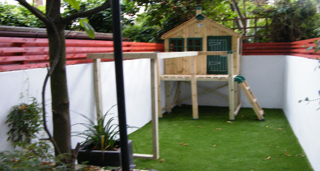 The children were not forgotten as they now have a playhouse, making use of the awkward ‘dog-leg’ corner with soft artificial turf to play on.